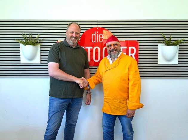 „Curry-Paule” wächst weiter: Berliner Kultmarke holt dritten starken Lizenzpartner an Bord