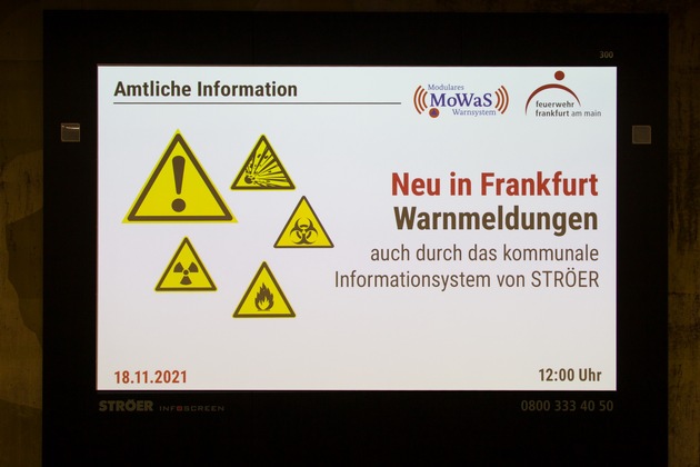 FW-F: Frankfurt stärkt Bevölkerungswarnung // Feuerwehr steuert über satellitengestütztes Warnsystem nicht nur Medien und Warnapps an, sondern auch die digitalen Screens von Ströer.