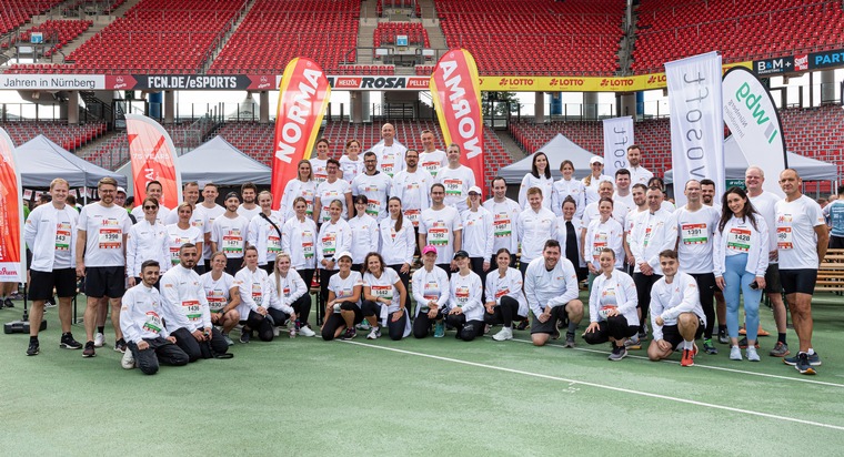 NORMA: Vom Azubi bis zur Geschäftsleitung: Mehr als 100 Läuferinnen und Läufer von NORMA beim diesjährigen B2Run-Firmenlauf in Nürnberg / Erneut mit eigenem Team-Stand mitten im Max-Morlock-Stadion