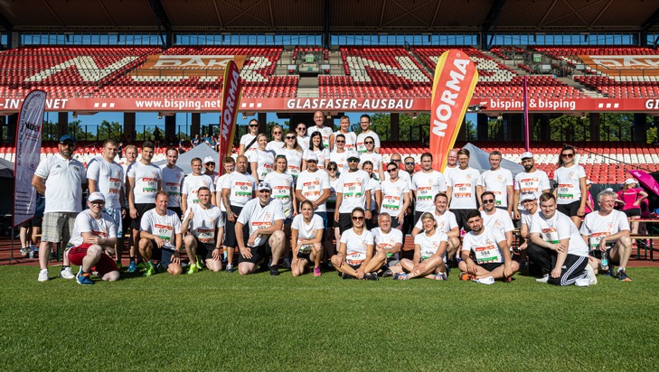 NORMA: NORMA gewinnt Titel "Fitteste Firma" beim B2Run-Firmenlauf in Nürnberg / Zusammenhalt und Sportbegeisterung - Teamstand mitten im Max-Morlock-Stadion