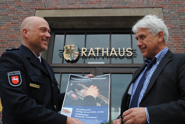 POL-CUX: Neuausrichtung des Präventionsrates Nordenham + Bürgermeister Hans Francksen und Polizeichef Michael Hasselmann holen Polizeimusikkorps nach Nordenham (Plakat als Download)