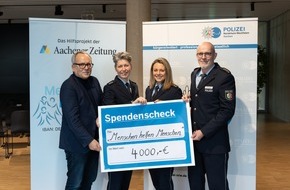 Polizei Aachen: POL-AC: Adventskonzert der Polizei Aachen - Unterstützung für Hilfsinitiative "Menschen helfen Menschen"