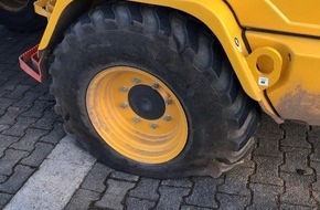 Polizeidirektion Landau: POL-PDLD: Landau - Reifen eines Radladers zerstochen