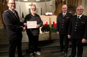 Feuerwehr Gemeinde Rheurdt: FW Rheurdt: Adventskonzert des Spielmannszuges Rheurdt spielt 2.000 Euro für Caritas ein