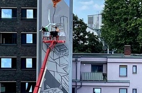 Kolpingwerk Deutschland gGmbH: Presseinladung: Erleben Sie die Entstehung eines der höchsten Graffitis in Köln