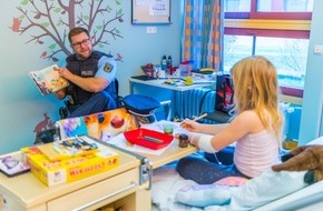 Bundespolizeiakademie: BPOL-AKAD: Bundespolizeiakademie erneut Gast in Lübecker Klinik für Kinder- und Jugendmedizin des UKSH zum bundesweiten Vorlesetag 2025