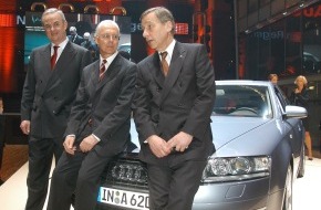 Audi AG: Drei Herren und ein Audi
