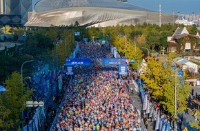 Information Office of Dalian Municipal Government: 30.000 Marathonbegeisterte entfachen mit ihrem Lauf die Schönheit von Dalian