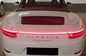 Polizeidirektion Hannover: POL-H: Hannover-Gro&szlig;-Buchholz: wei&szlig;er Porsche Carrera aus Tiefgarage gestohlen - Polizei sucht Zeuginnen und Zeugen