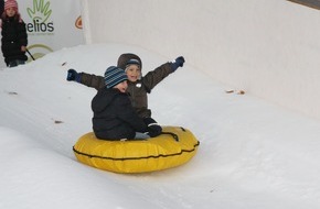 Stadtmarketing Wels GmbH: Der Schnee ist da! Bahn frei: Auf der iCover-Piste darf gerutscht werden - BILD