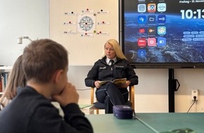 Polizeidirektion Göttingen: POL-GOE: Von "Schulhof-Spionen" und blinkenden Sternen: Polizeipräsidentin liest am bundesweiten Vorlesetag in Gittelder Grundschule