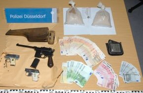 Polizei Düsseldorf: POL-D: Erfolgreiche Ermittlungen gegen Drogendealer - Zwei Festnahmen - Mehr als ein Kilo Heroin, 15.000 Euro Dealgeld und Schusswaffen sichergestellt - Foto hängt als Datei an