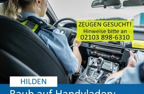 Polizei Mettmann: POL-ME: Raub auf Handyladen - mehrere Personen mit Pfefferspray besprüht - Hilden - 2311052