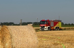 Feuerwehr Meerbusch: FW Meerbusch: Pressemitteilung der Feuerwehr Meerbusch zu einem Feldbrand bei gro&szlig;er Hitze nach Ausl&ouml;sung durch eine Ballenpresse