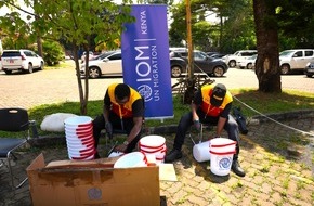 DHL Group: PM: DHL Group und Internationale Organisation für Migration schließen Partnerschaft zur Verbesserung humanitärer Logistik / PR: DHL Group and UN IOM forge global partnership to enhance humanitarian logistics