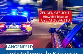 Polizei Mettmann: POL-ME: Raub auf Tankstelle: Täter bedroht Kassierer mit Schusswaffe - Langenfeld - 200107