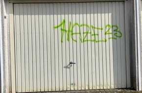 Kreispolizeibehörde Siegen-Wittgenstein: POL-SI: Unbekannte sprühen Graffitis auf Garagentore - #polsiwi
