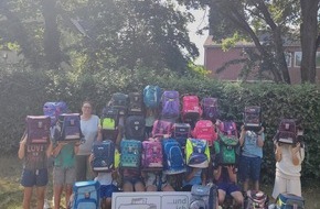 Provinzial Holding AG: &bdquo;Tonis&ldquo; mit Herz: Schulkinder in Wersten spenden Tornister an Kinder in Not