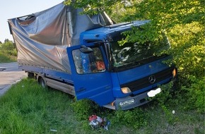 Polizeidirektion Ludwigshafen: POL-PDLU: Speyer- Verkehrsunfall im Begegnungsverkehr zwischen zwei Lkw in der Landauer Straße (21/2004)