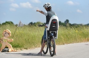 TÜV SÜD AG: TÜV SÜD: Sicher unterwegs mit dem Fahrradkindersitz