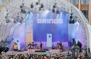 Kindernothilfe e.V.: Kindernothilfe mit Brings beim Kirchentag in Nürnberg „Superjeile Zick“: 8.000 Gäste beim Open-Air-Konzert