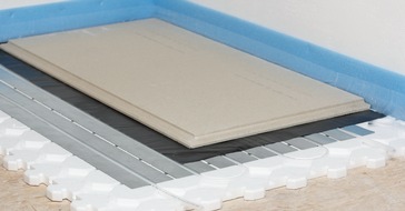 Selfio GmbH: Energetische Sanierung mit einer Fußbodenheizung