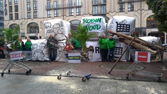 Robin Wood e.V.: Waldzerstörung für Supermarktprodukte stoppen! Protest beim Gipfeltreffen des Handels in Berlin