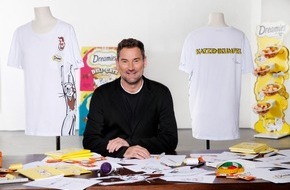 adam GmbH Co KG: Dreamies, jetzt groß in Mode zu gewinnen: das limitierte Katzenkumpel-Shirt von Michael Michalsky
