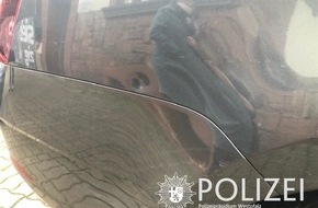 Polizeipräsidium Westpfalz: POL-PPWP: Fahrendes Auto beschädigt