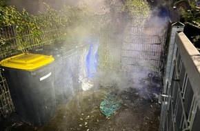 Polizei Mettmann: POL-ME: Mehrere Mülltonnen neben Kindergarten in Flammen - Hilden - 2412107