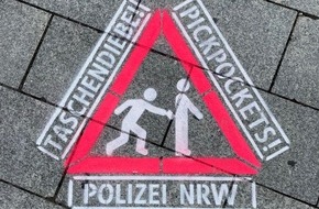 Polizei Hagen: POL-HA: Die Polizei Hagen warnt vor Taschendieben - Warnschilder im gesamten Stadtgebiet auf den Boden gesprüht