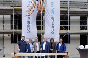 DORNIEDEN Gruppe GmbH & Co. KG: Die DORNIEDEN Gruppe feiert Richtfest &bdquo;Am Rheindorfer Bach&ldquo;