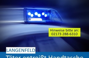 Polizei Mettmann: POL-ME: Handtasche entrissen - Polizei ermittelt und bittet um Hinweise - 2505041