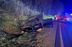 Polizeidirektion Trier: POL-PDTR: BMW landet auf dem Dach / Feuerwehr- und Polizeieinsatz auf der Pellinger Straße