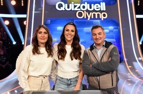 ARD Das Erste: Börsenwissen gegen den "Quizduell-Olymp": Anja Kohl und Markus Gürne bei Esther Sedlaczek / "Quizduell-Olymp" am Freitag, 22. März, 18:50 Uhr im Ersten