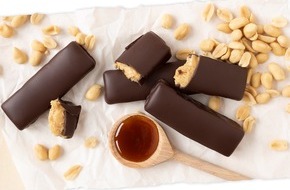 Veganz Group AG: Kulturwandel der Ernährung: Veganz bringt mit dem Choc Bar Peanut Caramel die Revolution ins Snackregal
