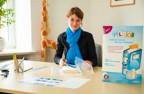 Handicap International e.V.: Aktion bei Kaufland zum Schulbeginn: Clever Schulbücher einbinden - und dabei Gutes tun! (BILD)