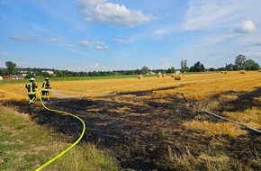 Freiwillige Feuerwehr Königswinter: FW Königswinter: Ballenpresse und Feld fangen Feuer