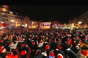 REKORD-INSTITUT für DEUTSCHLAND: Weihnachtliche Bestleistung für den größten Weihnachtstanz bei WDR LOKALZEIT – live im TV holen 870 Menschen den RID-Weltrekord nach Castrop-Rauxel