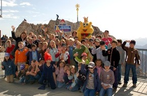 Intersnack Deutschland SE: Die l&auml;ngste Vorlesestaffel der Welt / Vorlese-Weltrekordversuch auf Deutschlands h&ouml;chstem Berg