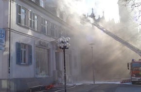 Polizeipräsidium Westpfalz: POL-PPWP: Brand eines Wohn-und Geschäftsgebäudes