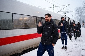 DB Fernverkehr AG: Im Extremwetter zum nächsten EM-Spiel: Handball-Profis fahren Bahn