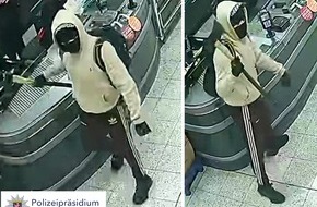 Polizeipr&auml;sidium Nordhessen - Kassel: POL-KS: &Ouml;ffentlichkeitsfahndung nach Raub mit Axt auf Fuldataler Supermarkt: Zeugen gesucht