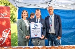 BUDNI Handels- und Service GmbH & Co. KG: Das längste Franzbrötchen der Welt: Der budni-Tag im Tierpark Hagenbeck