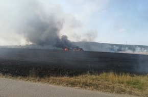 Polizeidirektion Koblenz: POL-PDKO: Rhens - Brand einer landwirtschaftlichen Zugmaschine samt Anhänger und eines Getreidefeldes oberhalb von Rhens