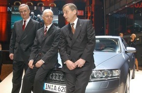 Audi AG: Drei Herren und ein Audi