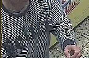 Polizei Düsseldorf: POL-D: Bewaffneter Überfall auf Tankstelle in Rath - Wer kennt den Täter? - Polizei fahndet jetzt mit Bildern aus der Überwachungskamera