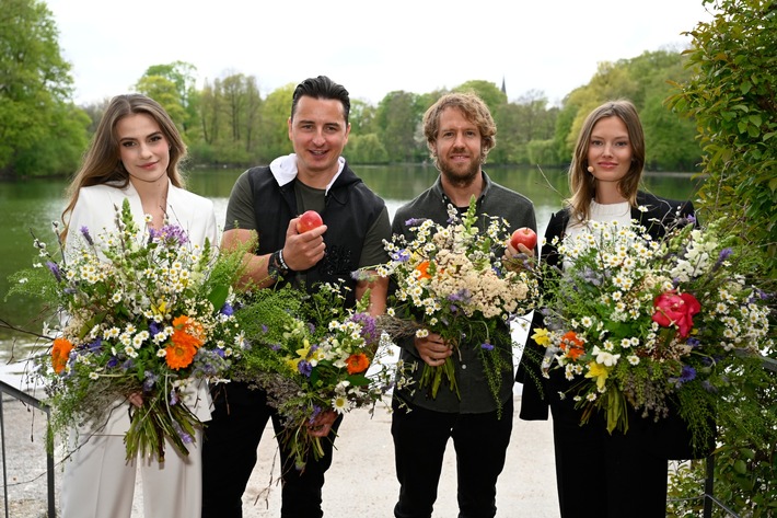 Gesellschaftsprojekt BioBienenApfel präsentiert: Sebastian Vettel und Andreas Gabalier schenken Deutschland 1 Million Blumen