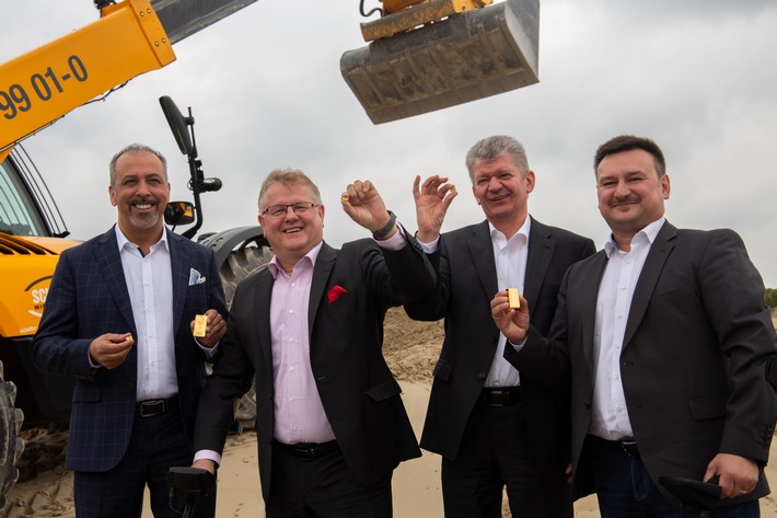 Wertvollster Sandberg der Welt im Münchner Olympiapark / Innovatives Cashback-System "wee" startet europäische Metropolenstrategie