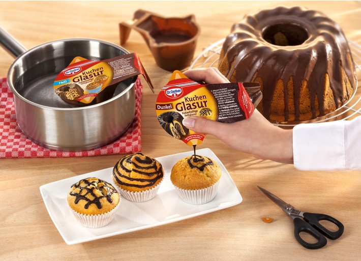 Alles im Griff?! / Dr. Oetker Kuchenglasuren im Becher - mit Griff und integrierten Tüllen für komfortables Glasieren & Verzieren (BILD)